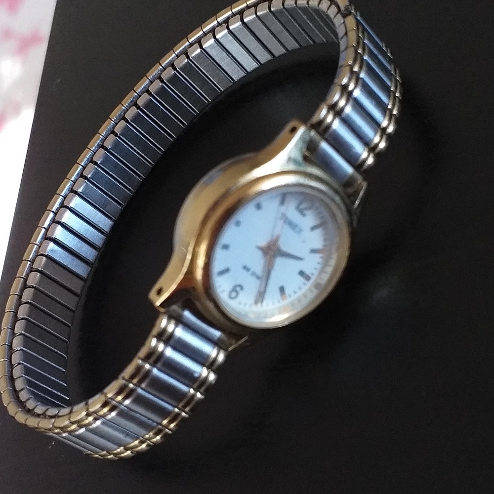 Timex Dime size watch OS